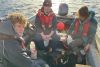 TY Students Dive into Marine Science at the Marine Institute. Dr Elvira deEyto with TY Students Finn McGovern and Eimhin White from Galway collecting water samples on Lough Furnace, Newport, Co. Mayo.